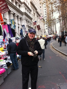 Mike buying a scarf on Wall Street